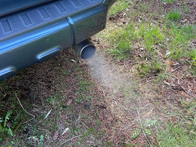 Check Engine Light Smoke from Exhaust: Causes and Fixes